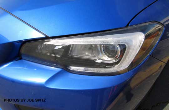 2015 WRX Limited left headlight with LEDs, black interior surround