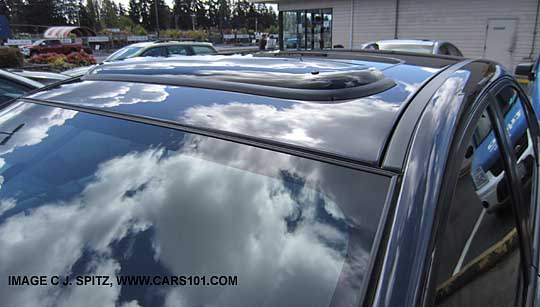 2015 subaru wrx or sti with optional moonroof air deflector, wrx shown, dark gray color