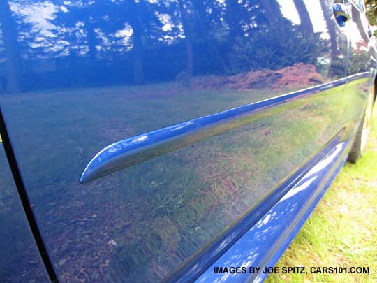 closeup of optional body side moldings, 2015 wrx and sti. wr blue color shown