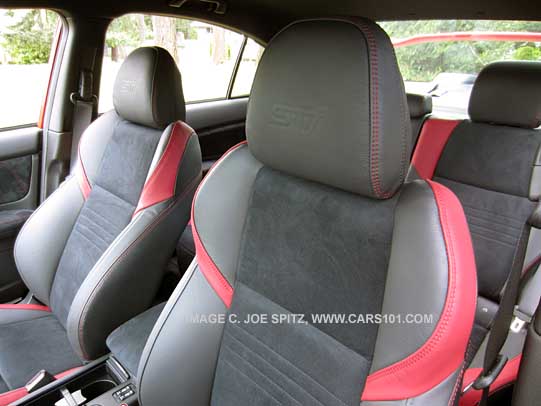 closeup on 2015 STI front headrest, black alcantara seat, leather trimmed