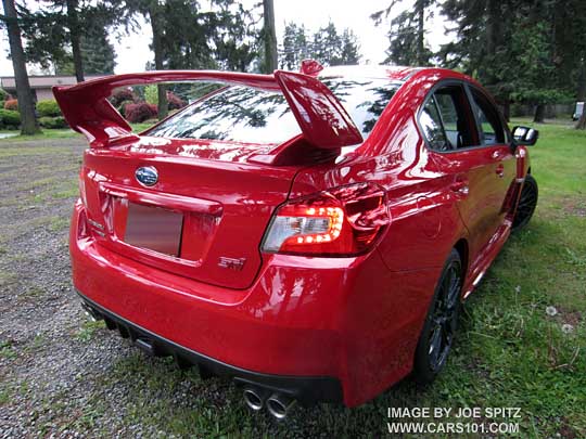 2015 STI rear, LEDs, spoiler. Lightning Red shown