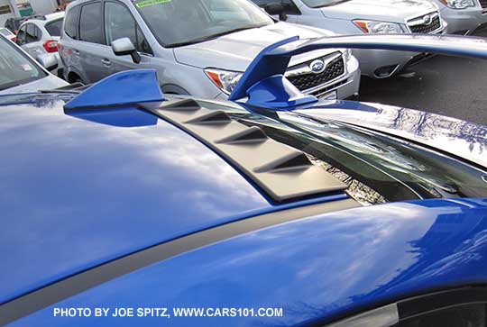 close up the optional rear vortex generator on the roof by the antenna. WR Blue STI shown.