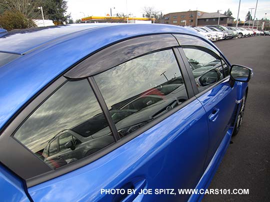 2015 WRX and STI optional side window rain drip moldings. WR Blue STI shown