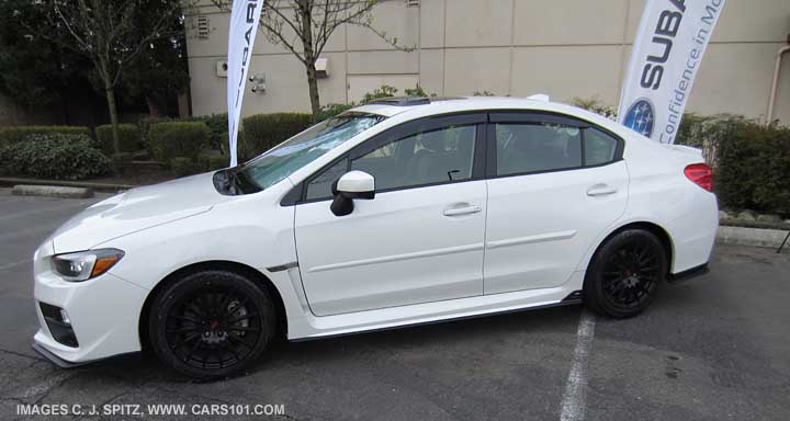 2015 WRX with optional side moldings, 17" black STI alloys, moonroof air deflector, window drip moldings, front, rear, side underspoilers