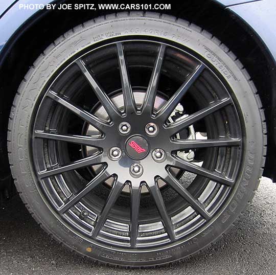 optional 15 spoke 18" black STI alloy wheel, part of the optional 2016 WRX Sport Package