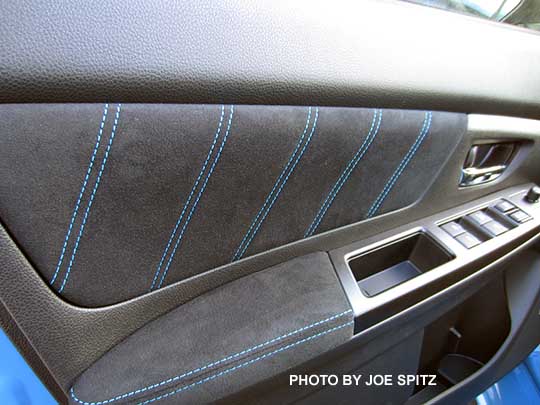 closeup of the 2016 WRX STI Series.Hyperblue door panel with hyperblue stitching