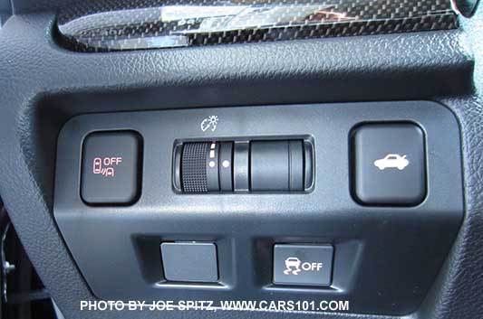 2017 and 2016 WRX and STI driver controls by driver's left knee, with blind spot and rear cross traffic alert off button, trunk release, VDC off, dash light adjustment