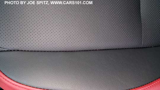 closeup of the 2016 Subaru WRX Limited carbon black perforated leather seating surface, red leather trim