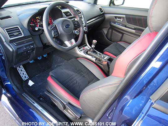 2016 Subaru STI with black alcantara material, manual driver's seat height adjustment