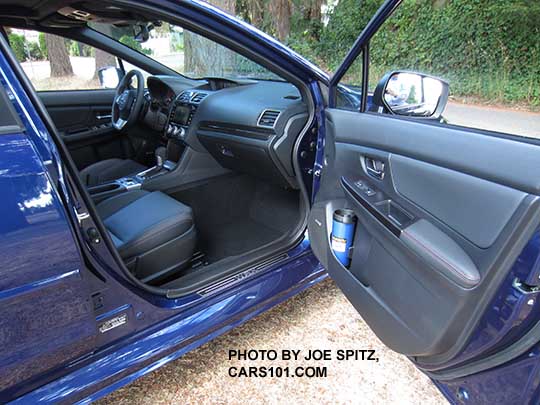 view of the passenger side and door of the 2016 Subaru WRX Limited center console with CVT automatic. Lapis blue car.