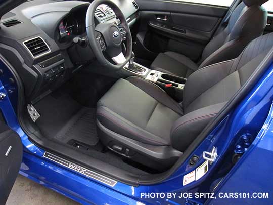 view of the driver's seat of the 2016 Subaru WRX Limited center console with CVT automatic. WR Blue show. Notice the optional WRX door sill plate.