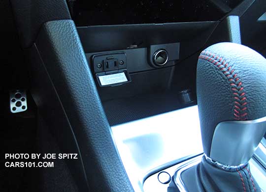 WRX, STI optional 100w power outlet in the front center console storage