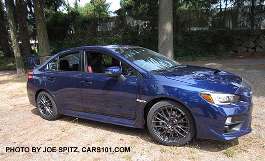2016 Subaru WRX STI with tall rear spoiler, lapis blue
