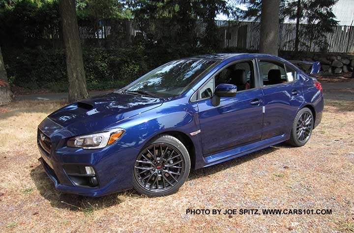 2016 Subaru WRX STI sedan with tall rear spoiler, new color for 2016 WRX, STI  lapis blue shown