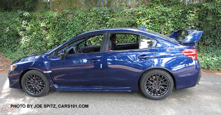 side view 2016 WRX STI with tall rear spoiler, lapis blue