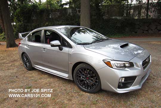 2016 Subaru WRX STI, standard rear spoiler and 18" gray alloys, ice silver