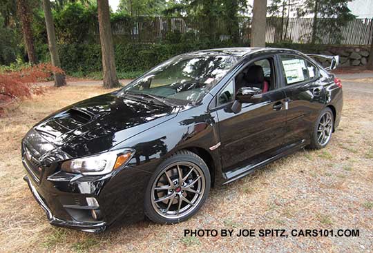 2016 Subaru WRX STI tall rear spoiler, 18" BBS alloys, black headlight surrounds, crystal black