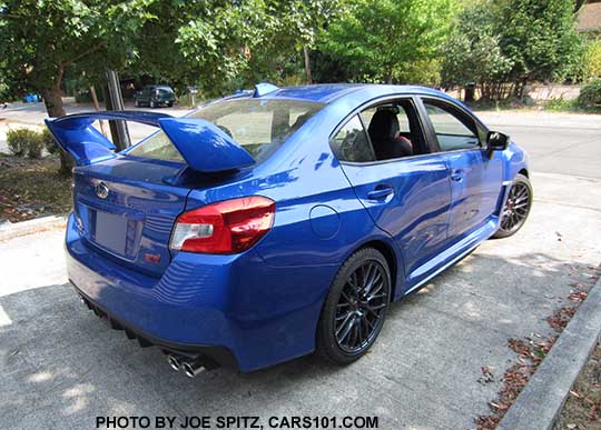 2016 Subaru WRX STI rear quarter view, WRX blue shown