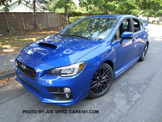 2016 Subaru STI front quarter view, WR world rally Blue