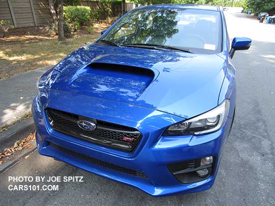 front view 2016 Subaru STI, with standard fog lights, black inner headlight surrounds, WR blue shown