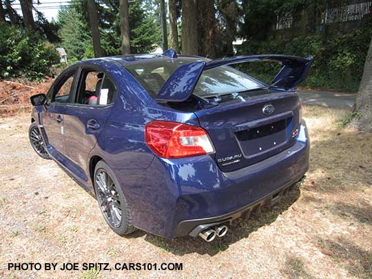 rear corner view 2016 lapis blue Subaru WRX STI with tall rear spoiler