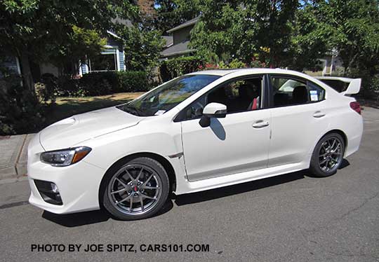 side view 2016 Subaru Impreza WRX STI Limited, 18" BBS Alloy wheels, tall spoiler, crystal white color