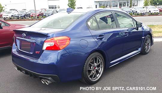 2017 and 2016 Subaru WRX STI Limited with small rear trunk lip spoiler. Lapis Blue color