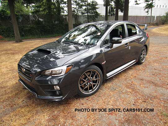 dark gray 2016 WRX STI Limited with  tall wing spoiler