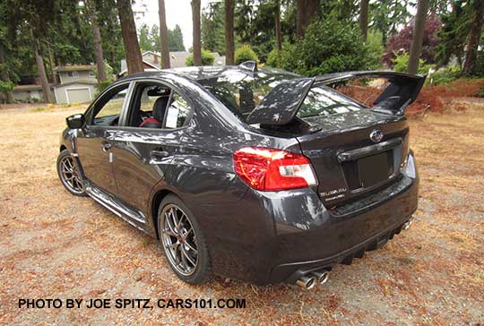 dark gray 2016 WRX STI Limited with  tall wing spoiler