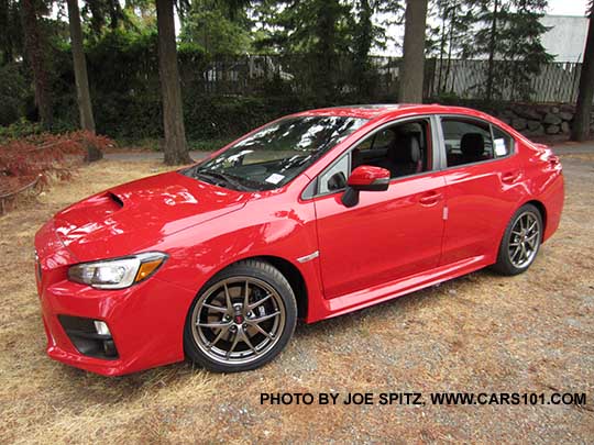 2016 STI Limited with small trunk lip spoiler, Pure Red color shown.