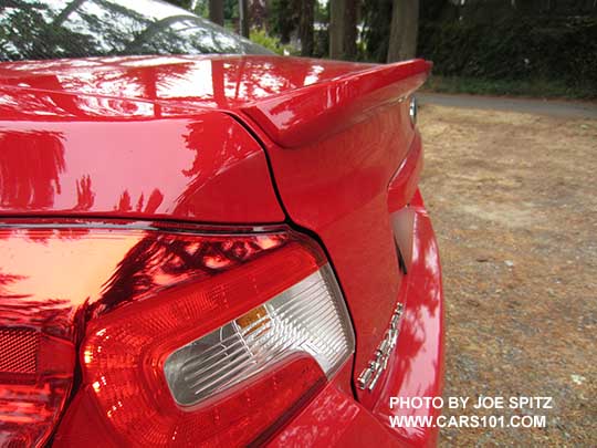 new for 2016 STI Limited small trunk lip spoiler, new for 2016 Pure Red color shown