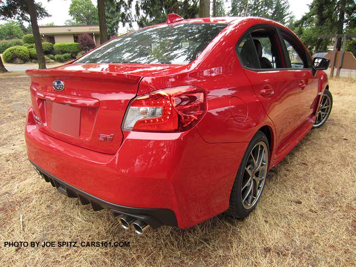 rear view 2016 STI Limited with NEW FOR 2016 small trunk lip spoiler and NEW FOR 2016 Pure Red color shown