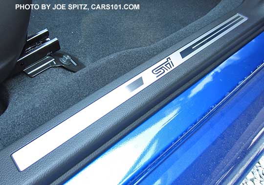 2016 STI standard front door sill plate, passenger side. WR Blue shown