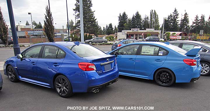 2016 STI Series.Hyperblue next to a 2016 WRX WR blue pearl color