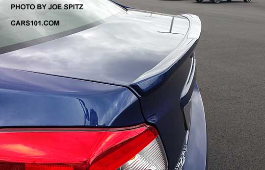 closeup of the 2016 Subaru WRX STI Limited small lip spoiler. Lapis blue