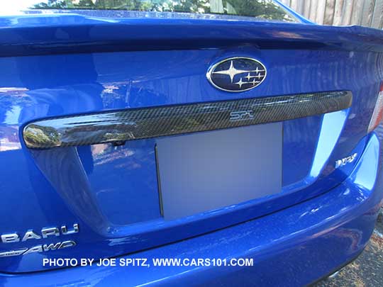 WR Blue colored 2016 WRX and STI optional carbon fiber plastic trunk trim. WRX shown