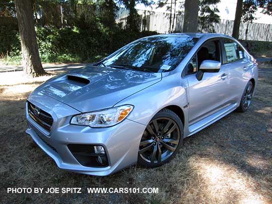 2016 WRX Premium ice silver sedan with silver headlight surrounds, fog lights, gray 5 split-spoke alloys