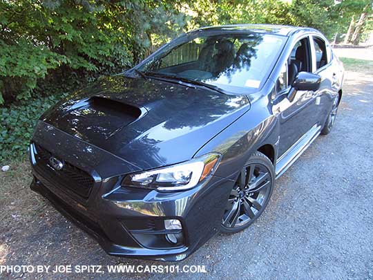 2016 Subaru WRX Limited front grill, fog lights, black inner headlight surrounds, 18" 5 split-spoke gray alloys, dark gray color