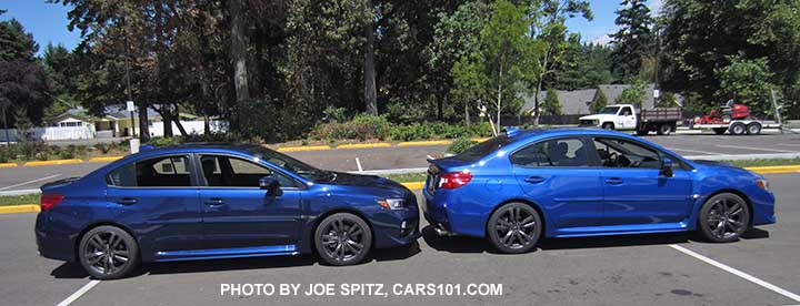 two 2016 Subaru WRXs-  Lapis Blue and WR Blue colors back-to-back