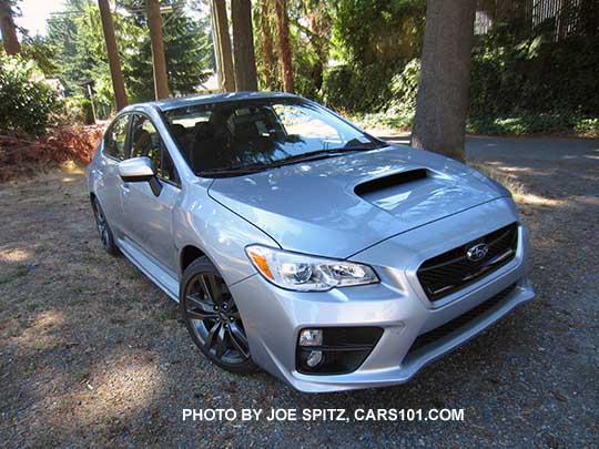 2016 Subaru WRX Premium has silver inner headlight surrounds, fog lights, 18" split-spoke gray alloys. Ice silver shown.