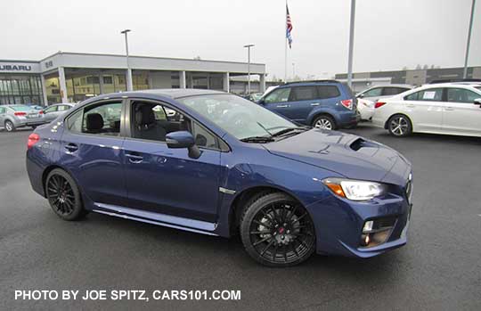 optional 18" black STI  alloy wheels, part of the  2017 and 2016 WRX Sport Package, Lapis Blue shown
