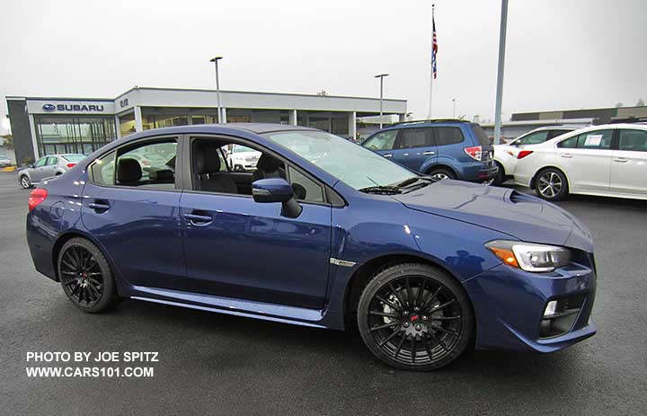 2016 WRX with optional Sport Package including 18" black STI alloy wheels. Lapis Blue shown.