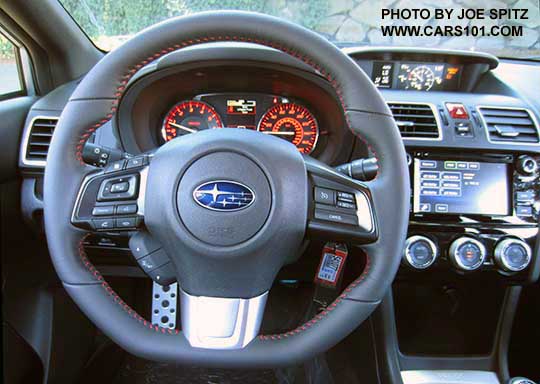 2016 WRX Premium steering wheel, leather wrapped. Notice the 6.2" audio screen with physical buttons