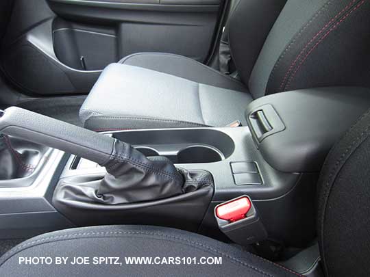 2017 WRX and STI optional popup center armrest. WRX shown