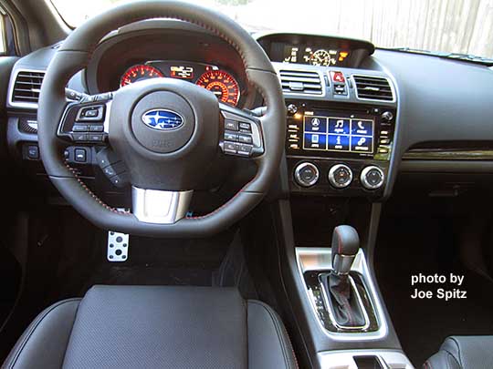 2017 WRX Limited steering wheel, 7" audio system, black leather interior, CVT automatic transmission shown