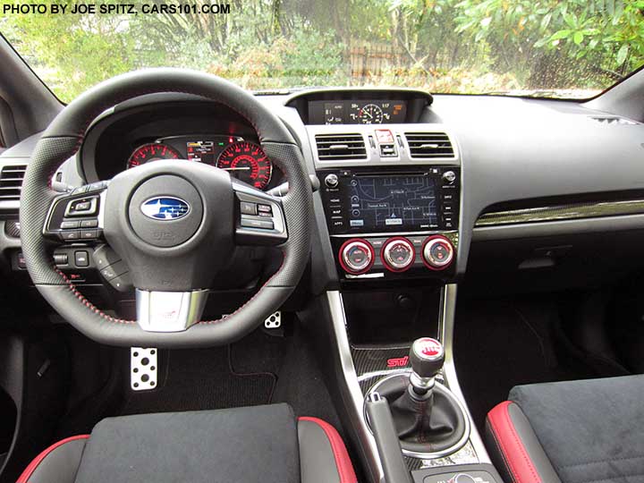 2017 WRX STI interior- black alcantara seats with red leather bolsters, red stitching, 7" navigation audio, plastic carbon fiber glossy dash trim