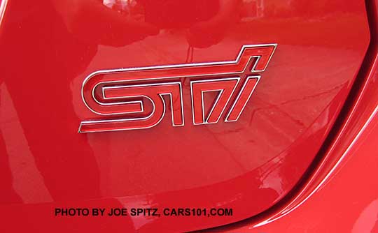 2017 Subarru WRX STI trunk STI logo, pure red car shown
