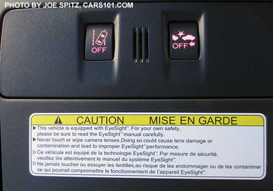 closeup of the 2017 Subaru WRX Limited Eyesight on/off buttons (shown lit at night), and warning label, bluetooth microphone