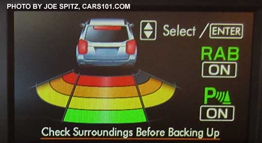 2017 Subaru WRX CVT with reverse automatic braking display in the trip computer showing where the object behind the car is.  In this image, it is directly behind and to both sides of the car.