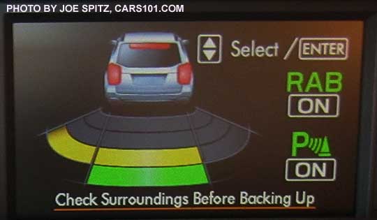 2017 Subaru WRX CVT with reverse automatic braking display in the trip computer showing where the object behind the car is.  In this image, it is directly behind and to the left driver's side of the car. the car